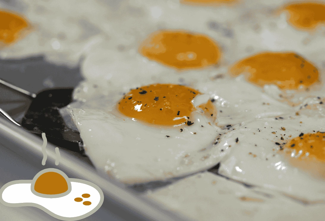 Sheet pan fried eggs for an easy, oven-baked breakfast, perfect for a crowd.