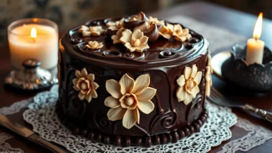 Slice of 1920's recipe for chocolate cake showing its tender and rich interior.